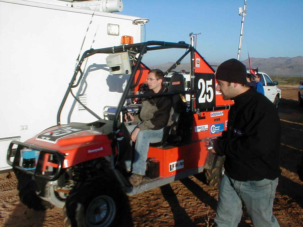 Tech's vehicle being driven off the course, after its brakes locked
                  up, disqualifying it from competition.