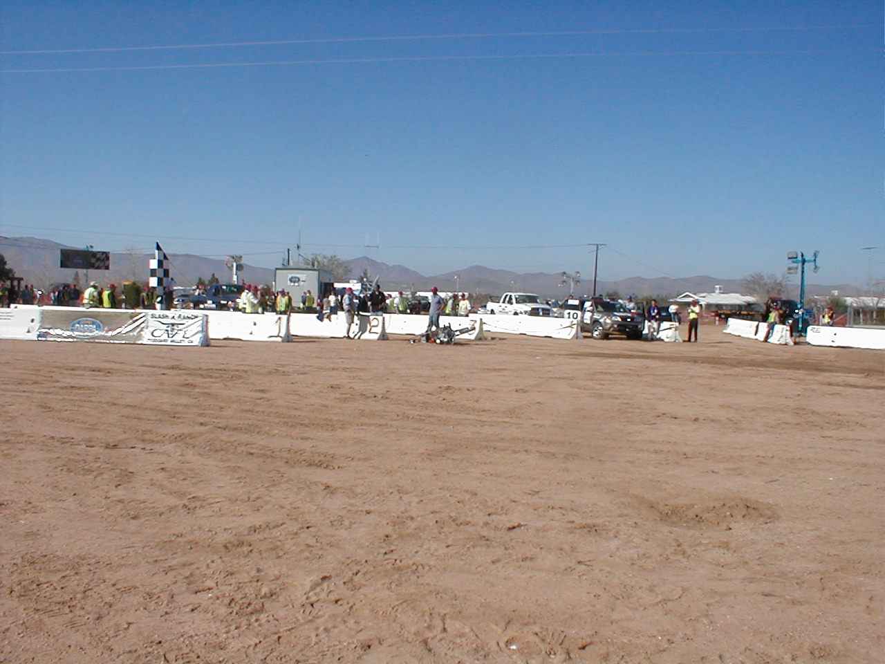 The Blue Team's self-driving motorcycle proved to be a limited success.
                  Here it is disabled, a few feet from the starting gate